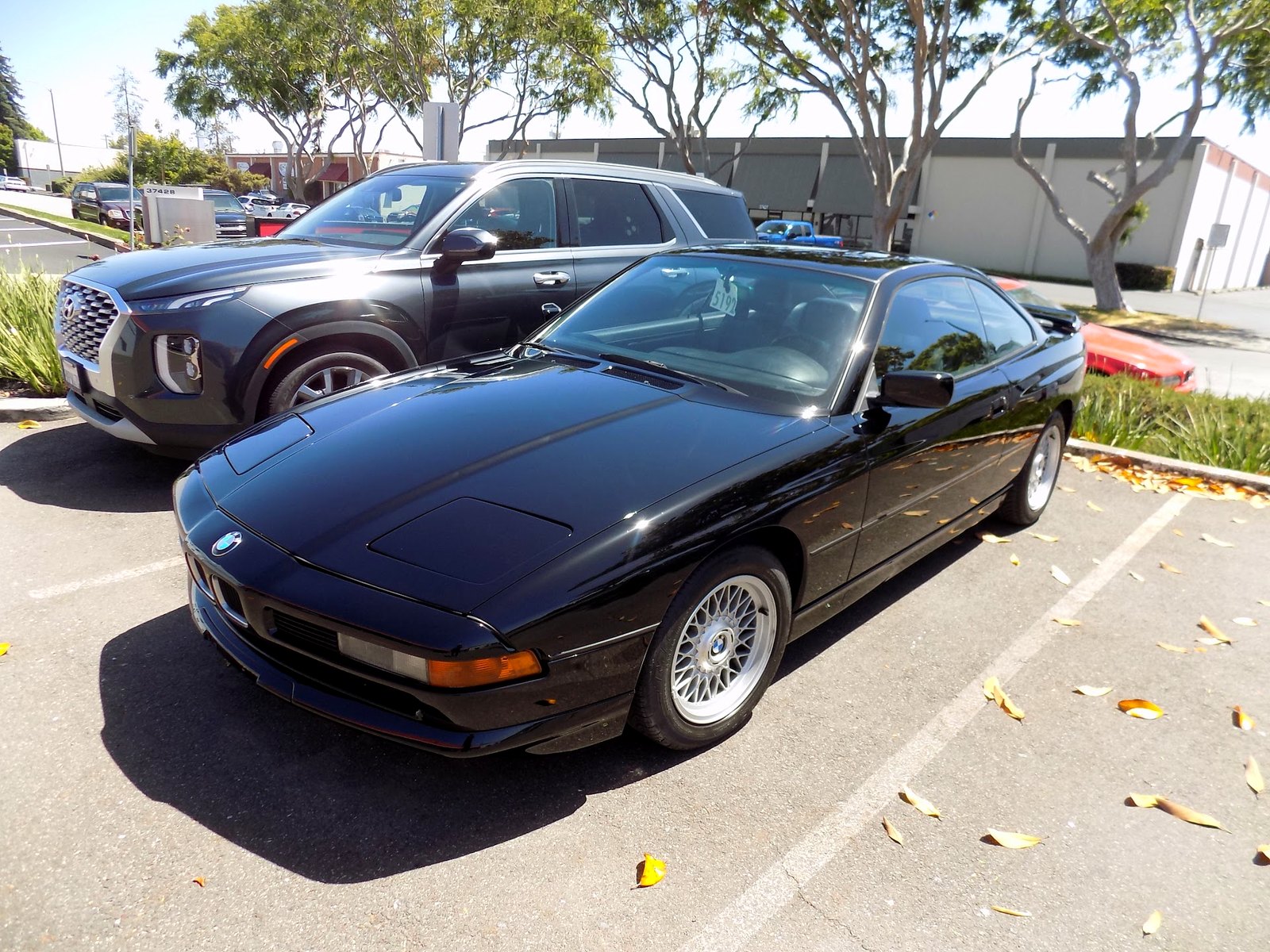 The same 1992 BMW 850i after its complete single-stage enamel paint job